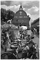 Malacca Town Square with trishaws and church. Malacca City, Malaysia ( black and white)