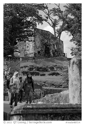 Malay tourists descend stairs from St Paul Hill. Malacca City, Malaysia (black and white)