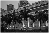 Fullerton Hotel facade at dusk. Singapore ( black and white)