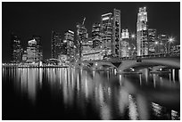 Bridge and Singapore skyline at night. Singapore ( black and white)