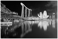 Helix Bridge, Marina Bay Sands, and ArtScience Museum at night. Singapore (black and white)