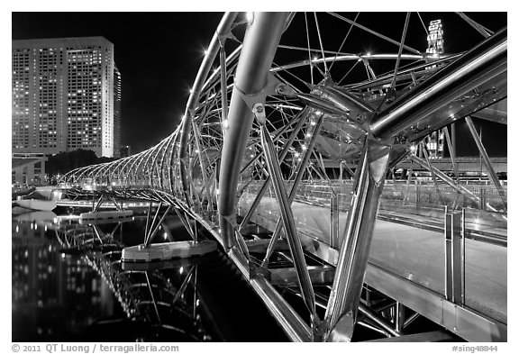 Double Helix Bridge in Marina Bay at night. Singapore (black and white)