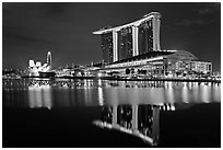 Marina Bay Sands resort and bay reflection at night. Singapore ( black and white)