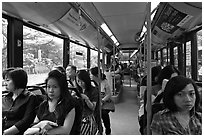 Riding a bus. Singapore ( black and white)