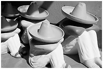 Ceramic statues of men with sombrero hats, Tlaquepaque. Jalisco, Mexico ( black and white)