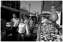 People strolling iin the sunday town-wide arts and crafts market, Tonala. Jalisco, Mexico (black and white)