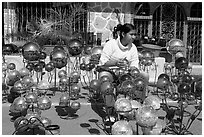 Woman polishing glass spheres, Tonala. Jalisco, Mexico (black and white)