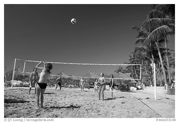 Vacationers playing beach volley-ball, Nuevo Vallarta, Nayarit. Jalisco, Mexico