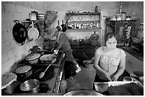 Woman and man in a restaurant kitchen, Jalisco. Jalisco, Mexico (black and white)