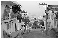 Steep street in morning foggy weather, Puerto Vallarta, Jalisco. Jalisco, Mexico ( black and white)