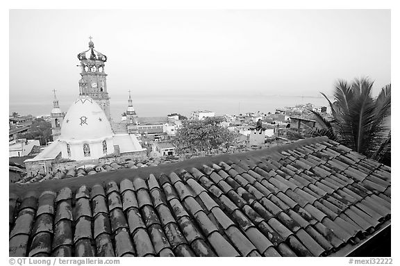 Tiled rooftop and Cathedral, and ocean at dawn, Puerto Vallarta, Jalisco. Jalisco, Mexico (black and white)