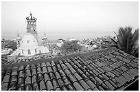 Tiled rooftop and Cathedral, and ocean at dawn, Puerto Vallarta, Jalisco. Jalisco, Mexico ( black and white)