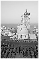 Red tile roof, Templo de Guadalupe Cathedral, and ocean early morning, Puerto Vallarta, Jalisco. Jalisco, Mexico ( black and white)
