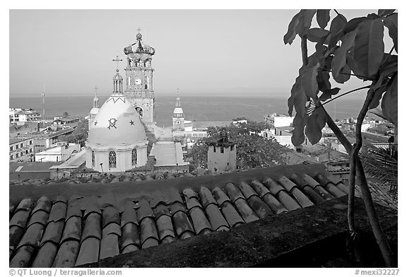 Red-tiled roof and Templo de Guadalupe Cathedral, early morning, Puerto Vallarta, Jalisco. Jalisco, Mexico