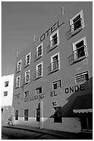Hotel restaurant building painted bright blue and yellow. Guanajuato, Mexico ( black and white)