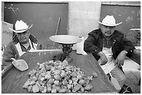 Men with cow-boy hats selling strawberries. Guanajuato, Mexico ( black and white)