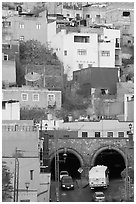 Houses on a hillside built above a tunnel. Guanajuato, Mexico ( black and white)
