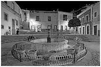 Fountain on Plazuela de los Angeles at night. Guanajuato, Mexico ( black and white)