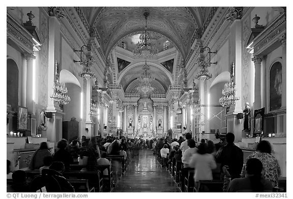 Inside of Basilica de Nuestra Senora Guanajuato during a mass. Guanajuato, Mexico (black and white)