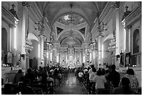 Inside of Basilica de Nuestra Senora Guanajuato during a mass. Guanajuato, Mexico ( black and white)