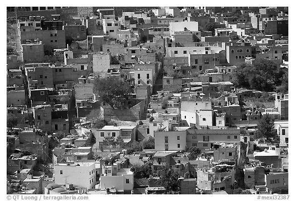 Brligly painted houses on hillside. Guanajuato, Mexico (black and white)