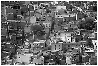Brligly painted houses on hillside. Guanajuato, Mexico ( black and white)