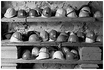 Hard hats used for descending into La Valenciana mine. Guanajuato, Mexico (black and white)