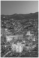 Panoramic view of the historic town with illuminated basilic, university, and La Compania. Guanajuato, Mexico ( black and white)