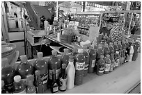 Chili bottles at a booth in Mercado Hidalgo. Guanajuato, Mexico ( black and white)