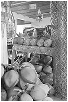 Tropical Fruit stand with girl in background. Mexico (black and white)