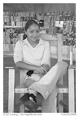 Woman in a fruit stand. Mexico (black and white)