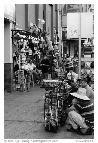 Souvenirs stands on sidewalk, Ensenada. Baja California, Mexico (black and white)