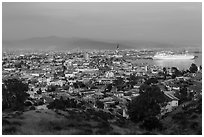 Panoramic view of city from hills at sunset, Ensenada. Baja California, Mexico ( black and white)