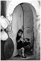 Girl in a doorway. Jerusalem, Israel (black and white)