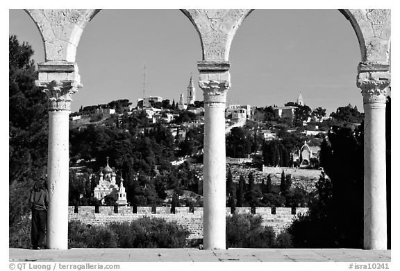 Spires and Mount of Olives seen through arches. Jerusalem, Israel