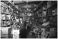 Man in a store, Hebron. West Bank, Occupied Territories (Israel) ( black and white)