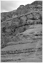 Monastery perched on the side of a steep clif. West Bank, Occupied Territories (Israel) ( black and white)