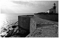 Seawall and lighthouse, late afternoon, Akko (Acre). Israel (black and white)