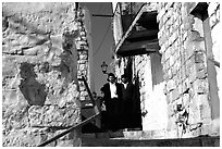 Orthodox jews in a narrow alley, Safed (Tsfat). Israel ( black and white)