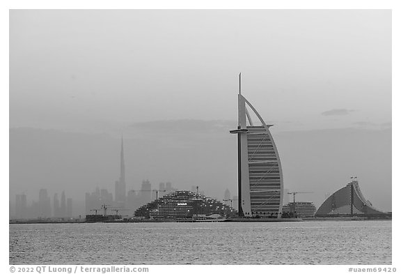 Burj Al Arab and downtown skyline from Palm Jumeira. United Arab Emirates (black and white)