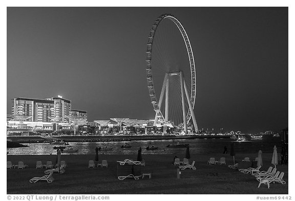 JBR Beach and Ain Dubai Ferris Wheel at night. United Arab Emirates (black and white)