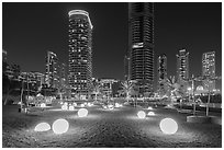 Park along Marina Promenade at night. United Arab Emirates ( black and white)