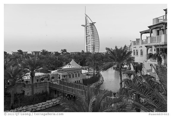 Medina Jumerah lush gardens and Burj Al Arab. United Arab Emirates (black and white)