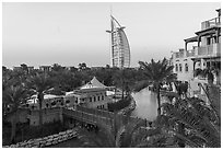Medina Jumerah lush gardens and Burj Al Arab. United Arab Emirates ( black and white)