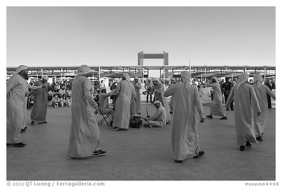 Men performing dance. Expo 2020, Dubai, United Arab Emirates (black and white)