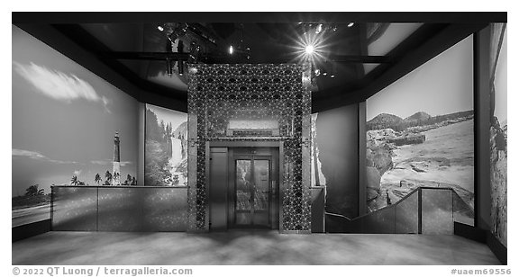 Upper floor of Exhibit 5 with elevator in middle, USA Pavilion. Expo 2020, Dubai, United Arab Emirates (black and white)