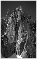 The Super-Couloir on Mt Blanc du Tacul is the very steep and narrow gully, Mont-Blanc Range, Alps, France. (black and white)