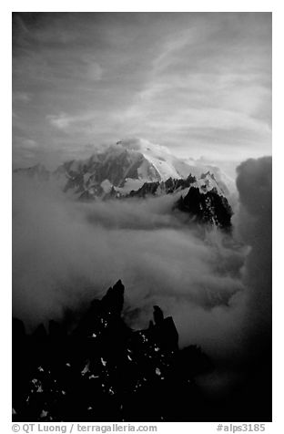 Mont Blanc and approaching storm clouds seen from Les Drus. Alps, France
