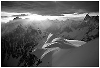 Aiguilles de Chamonix, Courtes-Verte ridge, and Grandes Jorasses seen from Aiguille du Midi. Alps, France (black and white)