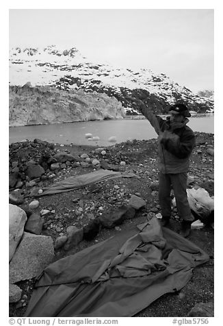 Setting up a tent in front of Lamplugh Glacier. Glacier Bay National Park, Alaska